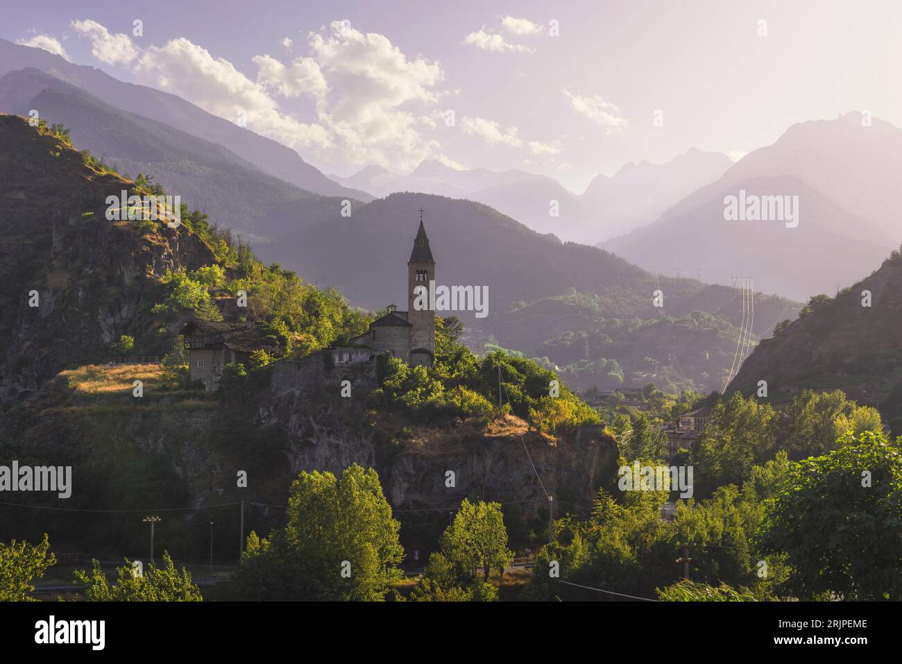 Santa Maria Assunta church on the rocky outcrop. Saint Roch, Villeneuve. Aosta valley region, Italy Stock Photo