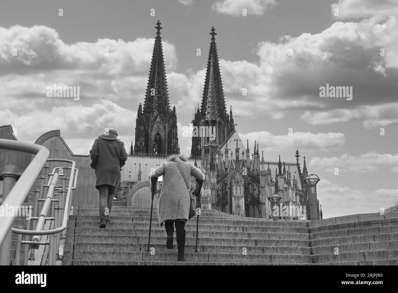 stairs to the Cologne Philharmonic Hall with the cathedral in the background,black and white photo Stock Photo