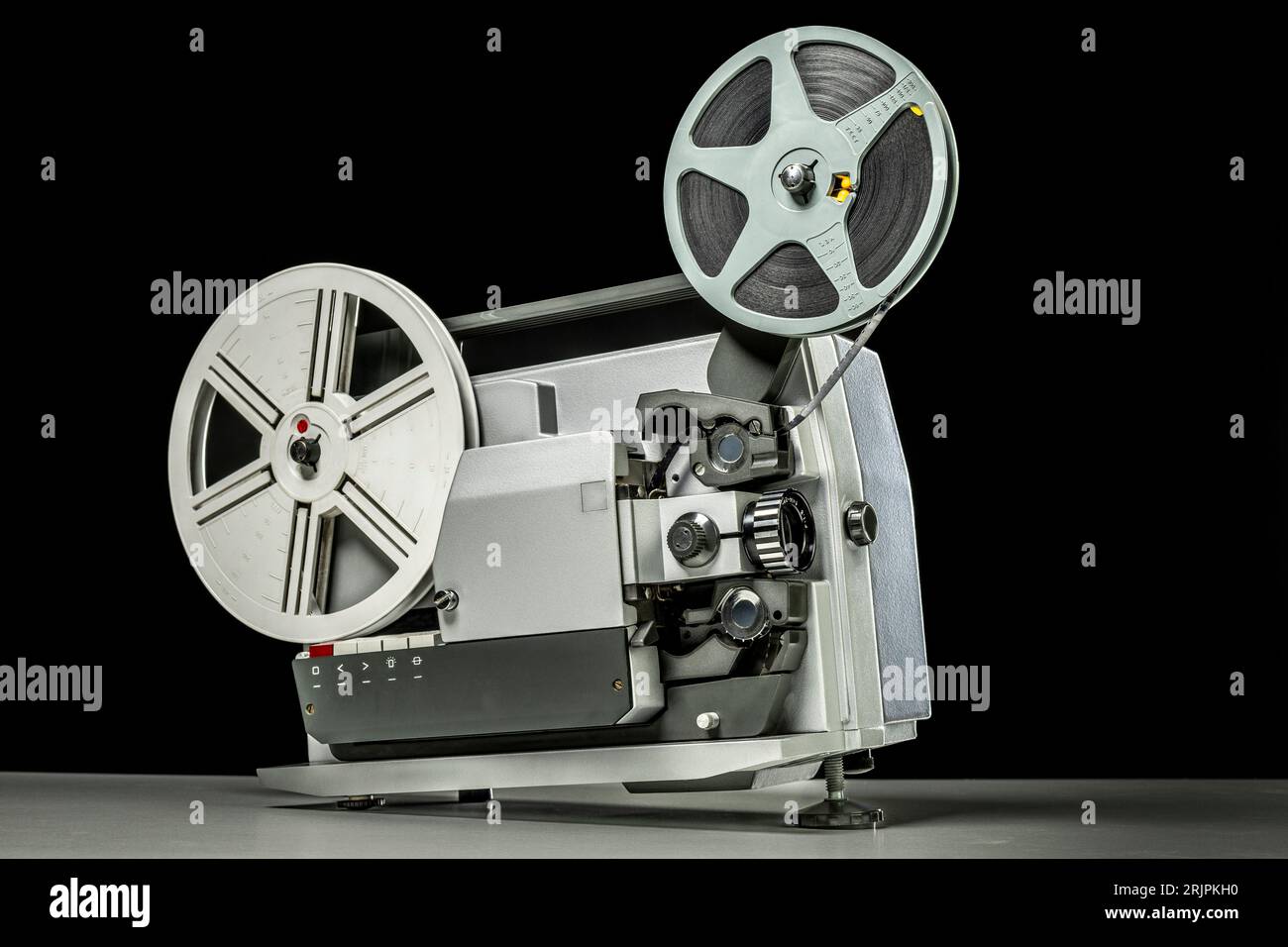 vintage super 8 projector on black background Stock Photo
