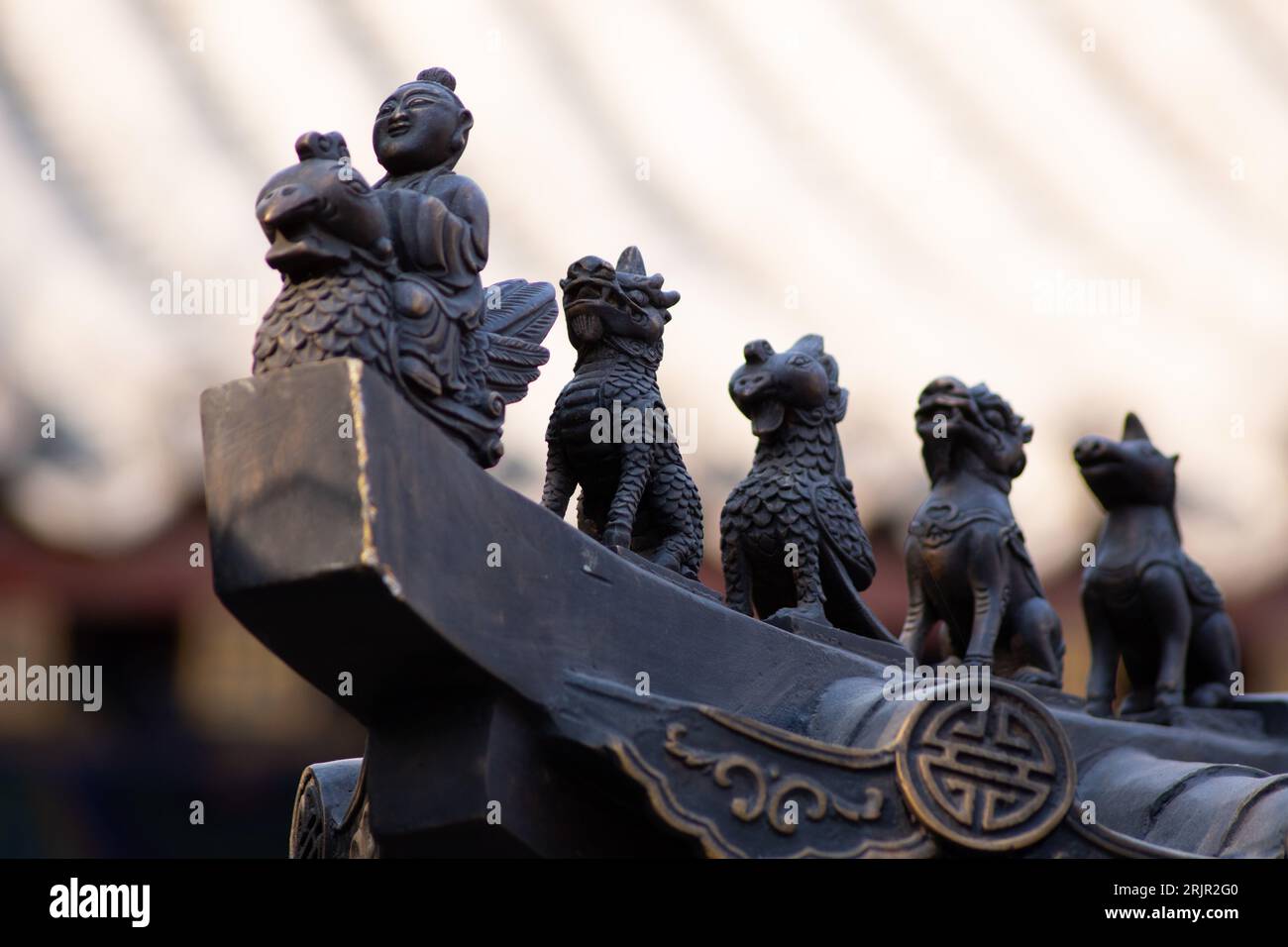 The Chinese mythologic figurines on Laoshan's Laozi's rooftop, China Stock Photo