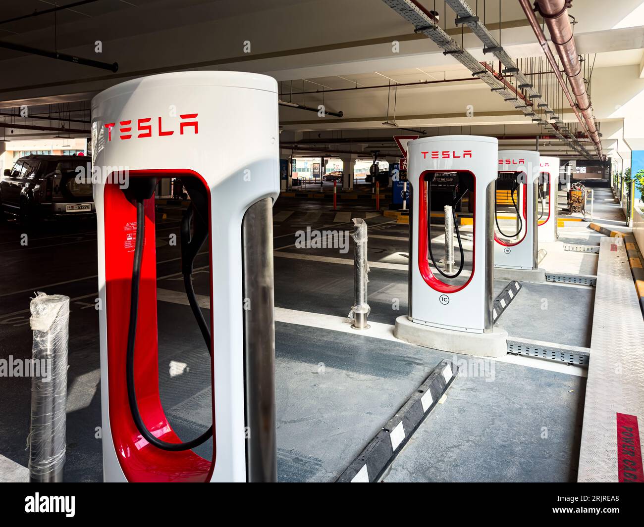 Tesla Charging stations in a mall parking lot at Masdar City, Abu Dhabi Stock Photo Alamy