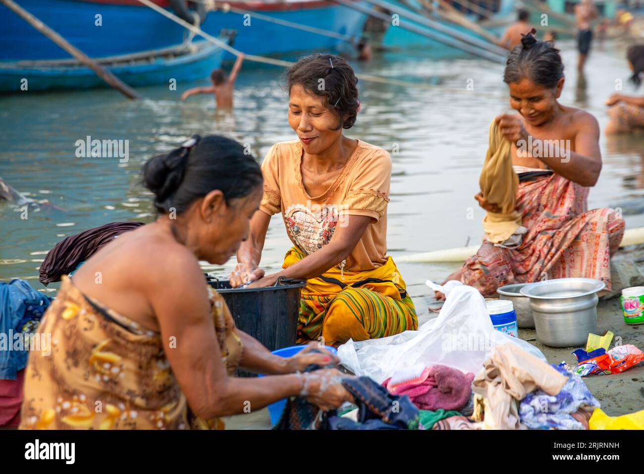 Women at the river Stock Photo - Alamy