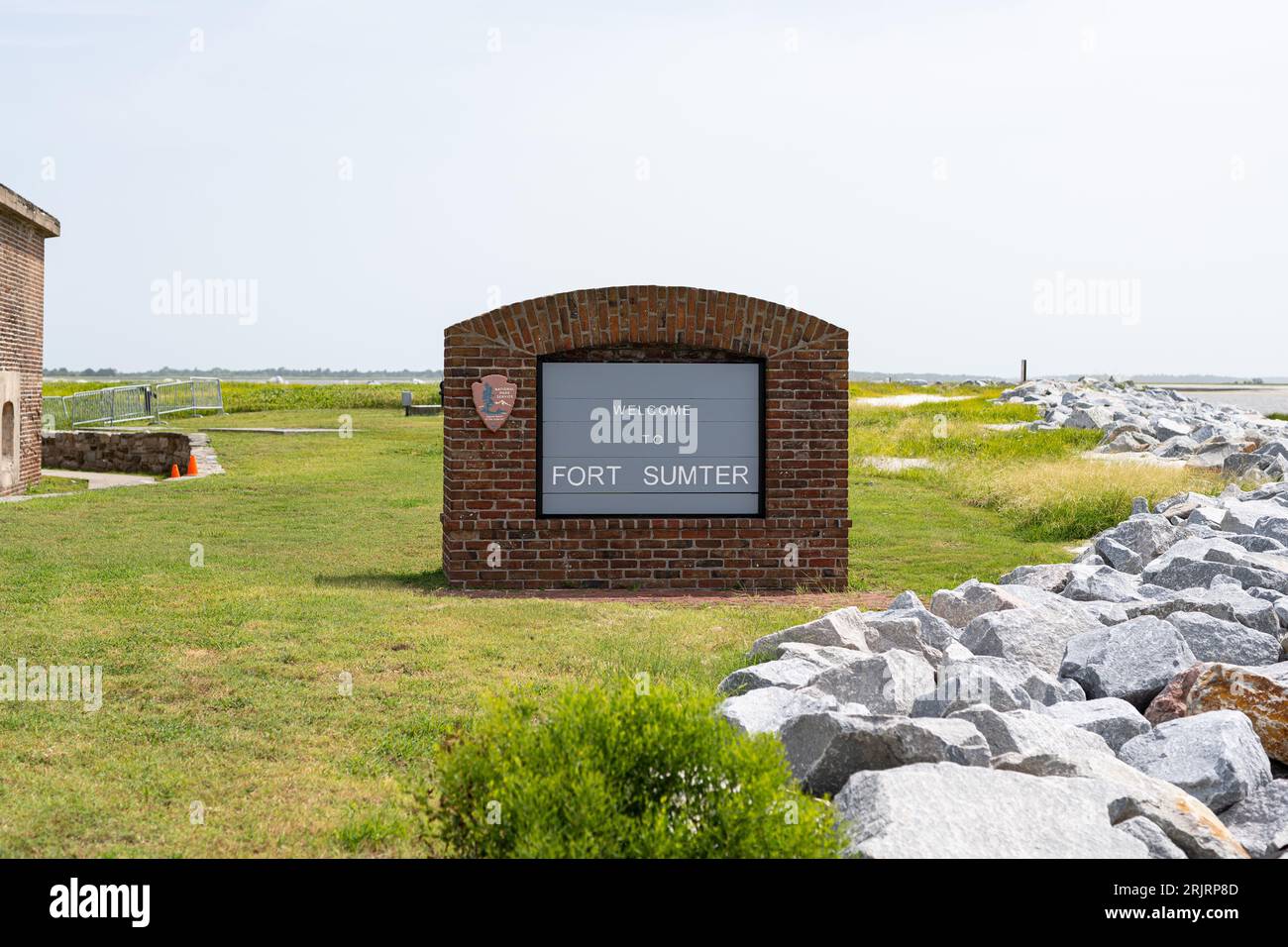 A National Park sign at the entrance of Fort Sumter National Monument Stock Photo
