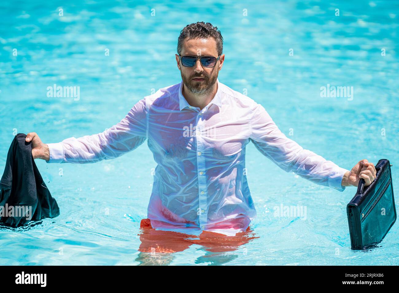 Businessman successful deal. Successful project. Businessman in swimming pool. business man on summer vacation. Business success man outdoor. Business Stock Photo