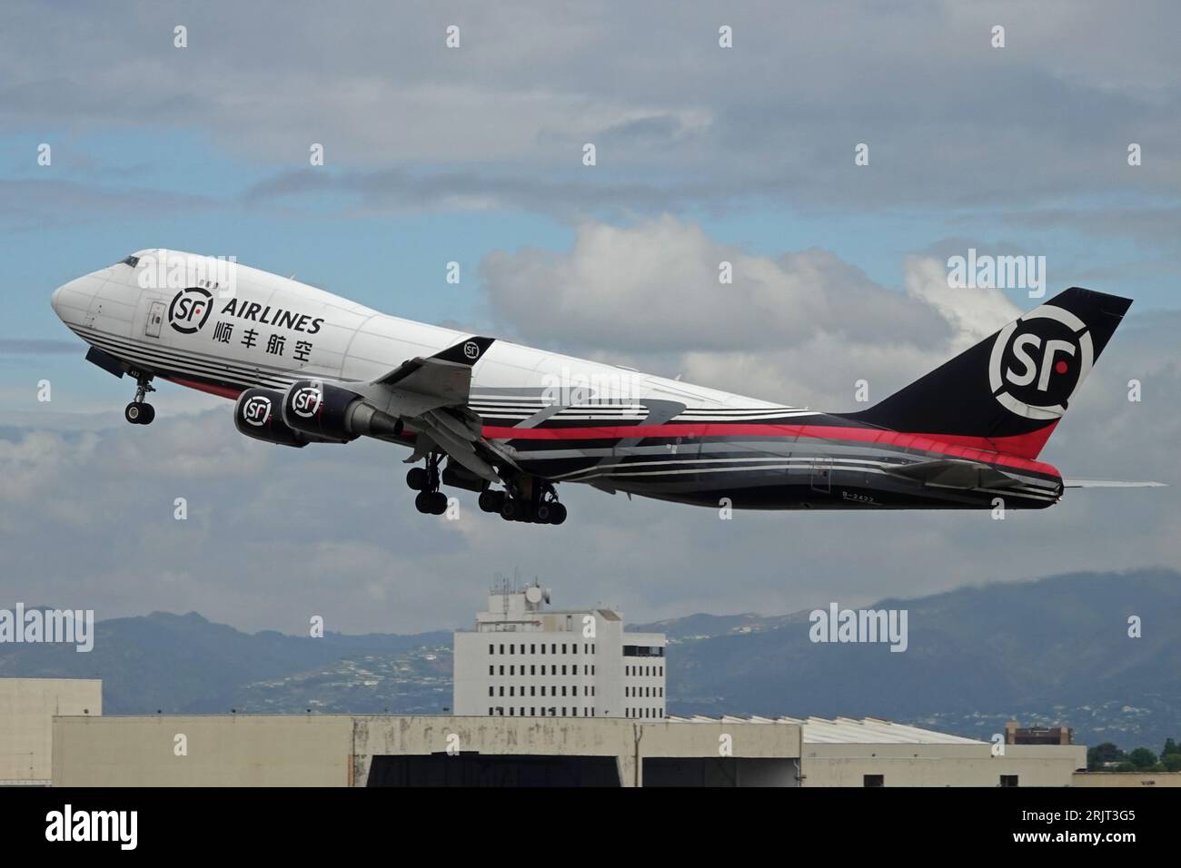 Los Angeles, California, USA - Aug. 21, 2023: A Boeing 747-400, operated by Chinese cargo shipping company SF Airlines, is shown taking off. Stock Photo