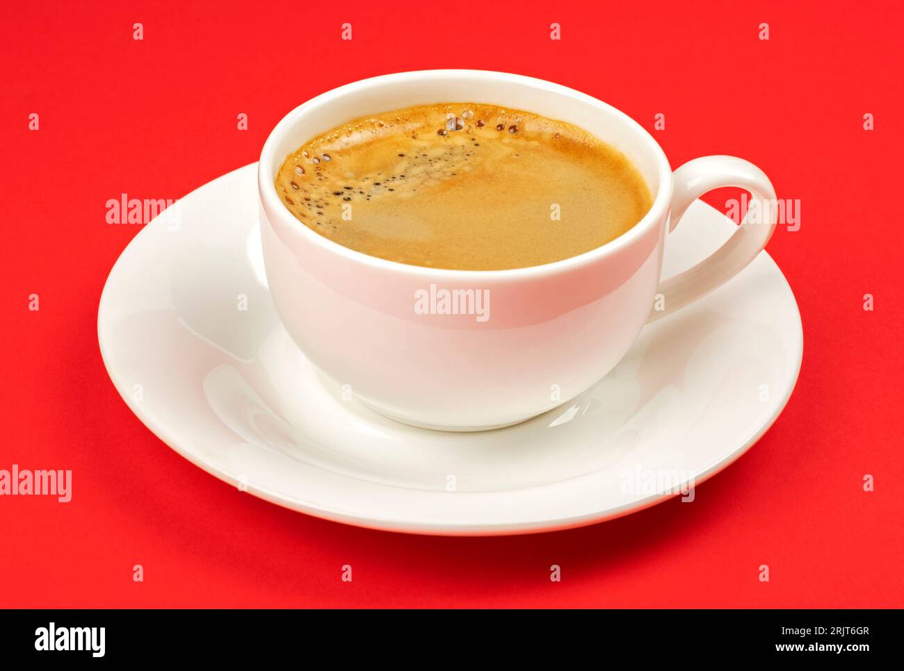 Cup of espresso on red background Stock Photo