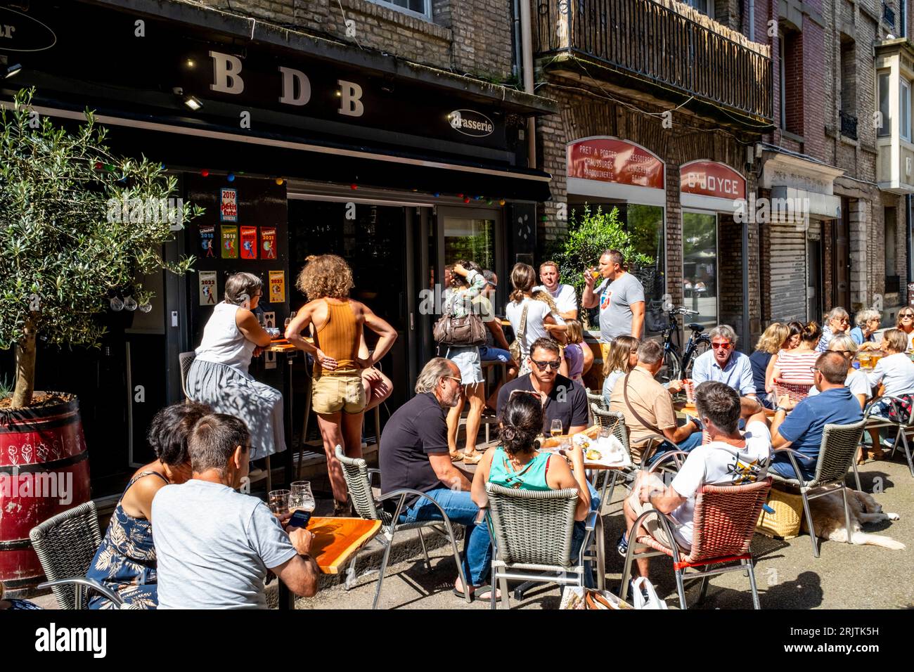 People Sitting Outside A Bar In Dieppe, Normandie, France Stock Photo