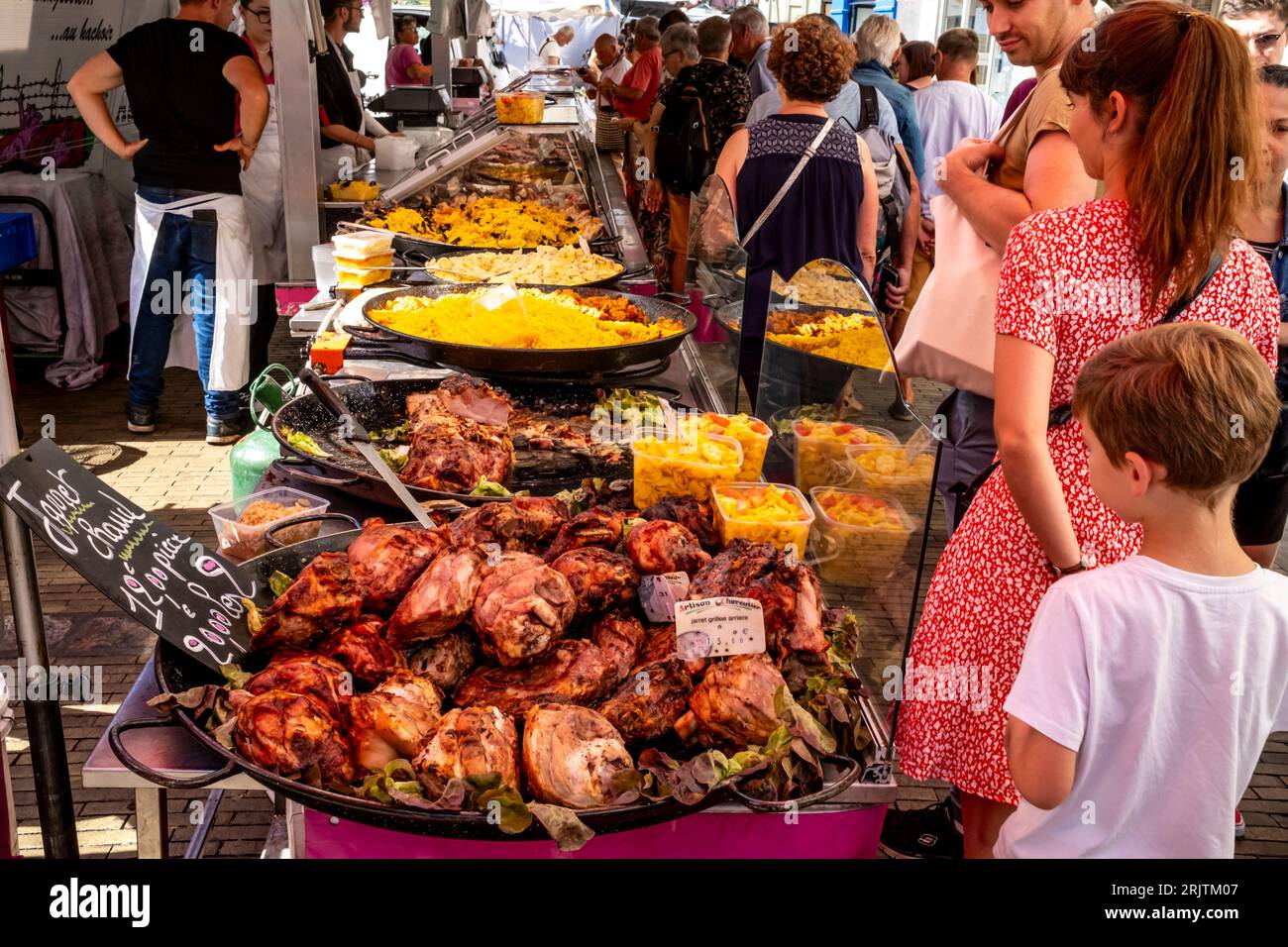 Local People Buying Cooked Meat Products At The Saturday Market In Dieppe, Seine-Maritime Department, France. Stock Photo