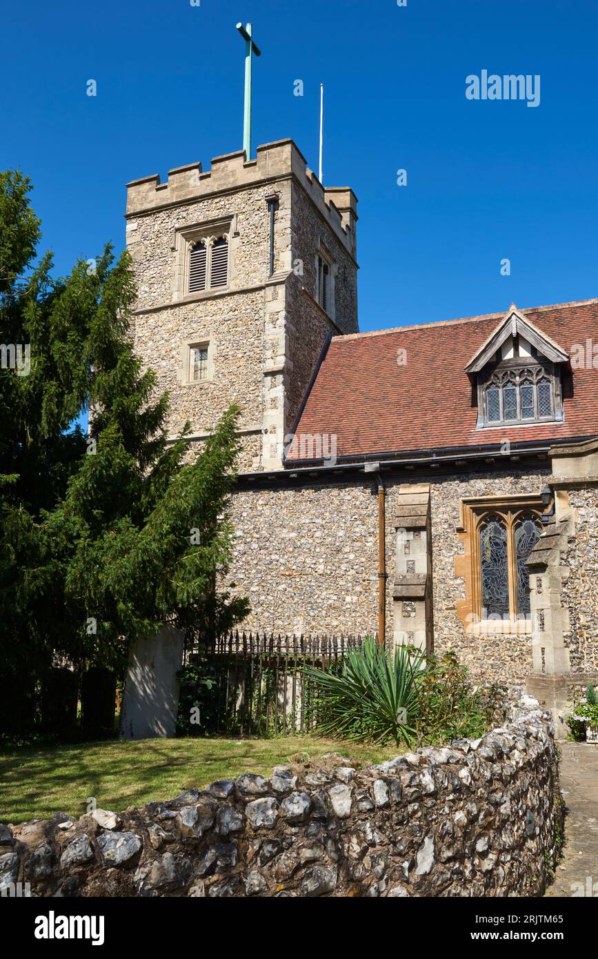 The exterior of the historic church of St John the Baptist, at Pinner, Middlesex, dating from the 14th and 15th centuries Stock Photo