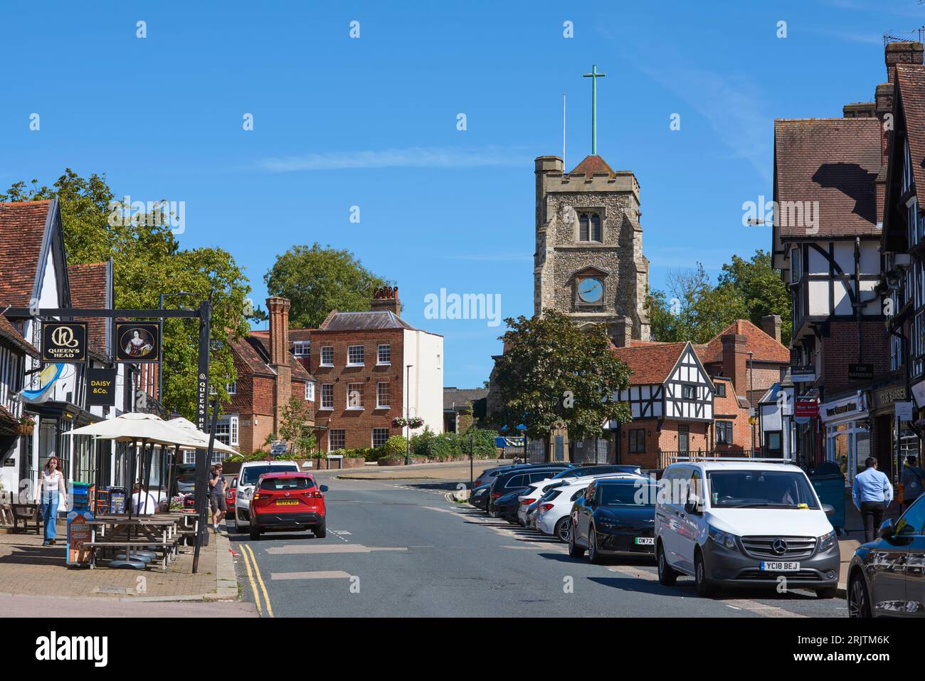 The High Street at Pinner Village, Middlesex, Greater London UK, looking towards Pinner church Stock Photo
