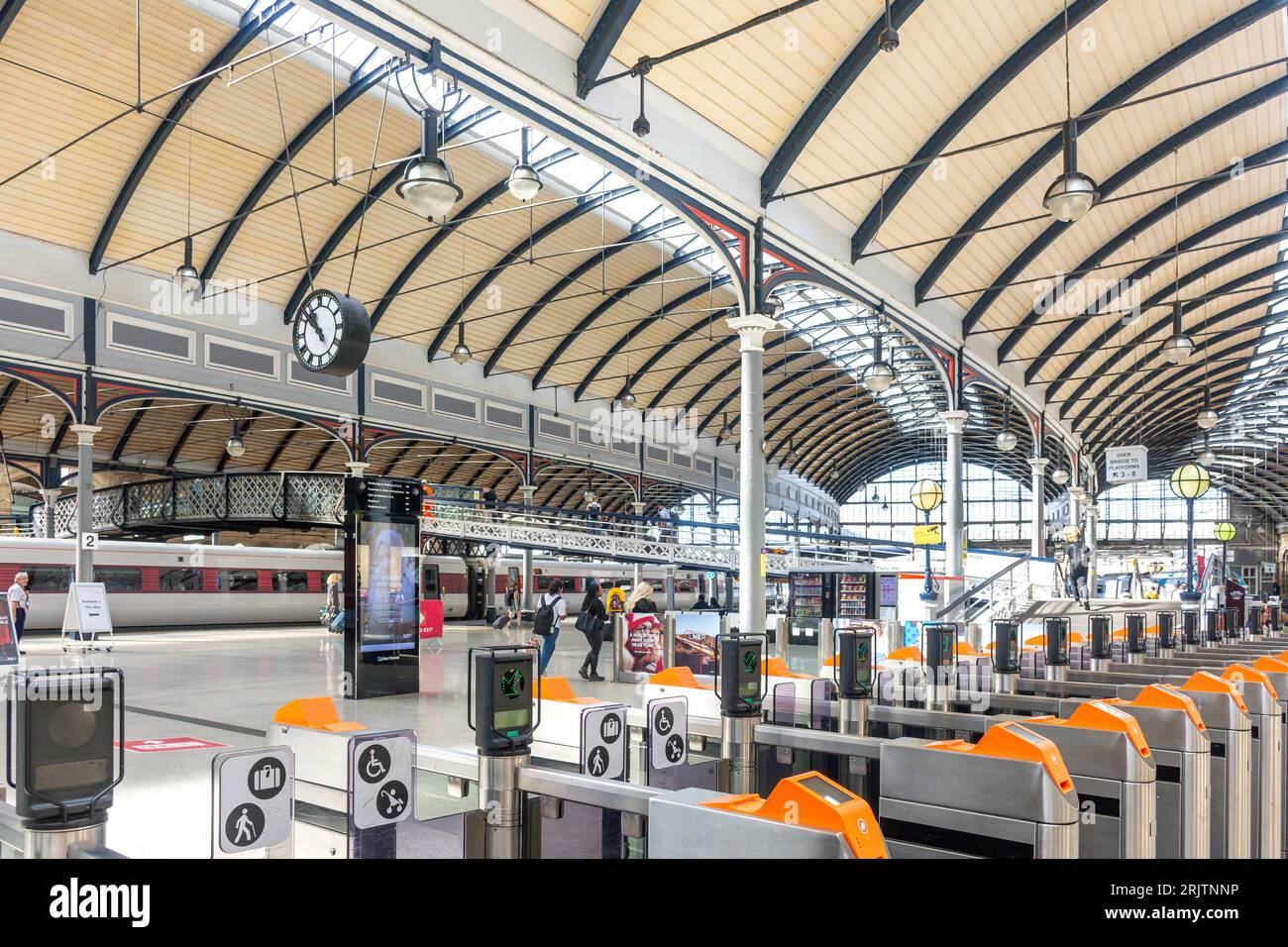 Electronic ticket gates inside interior of newcastle railway sta hi-res ...