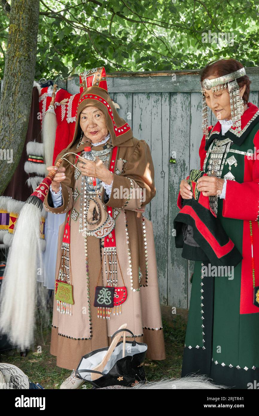 Kolomna, Russia, 12 June 2022. Celebration of the Day of Russia. Elderly Yakut women in national costumes. Elderly Yakut women showing national clothe Stock Photo