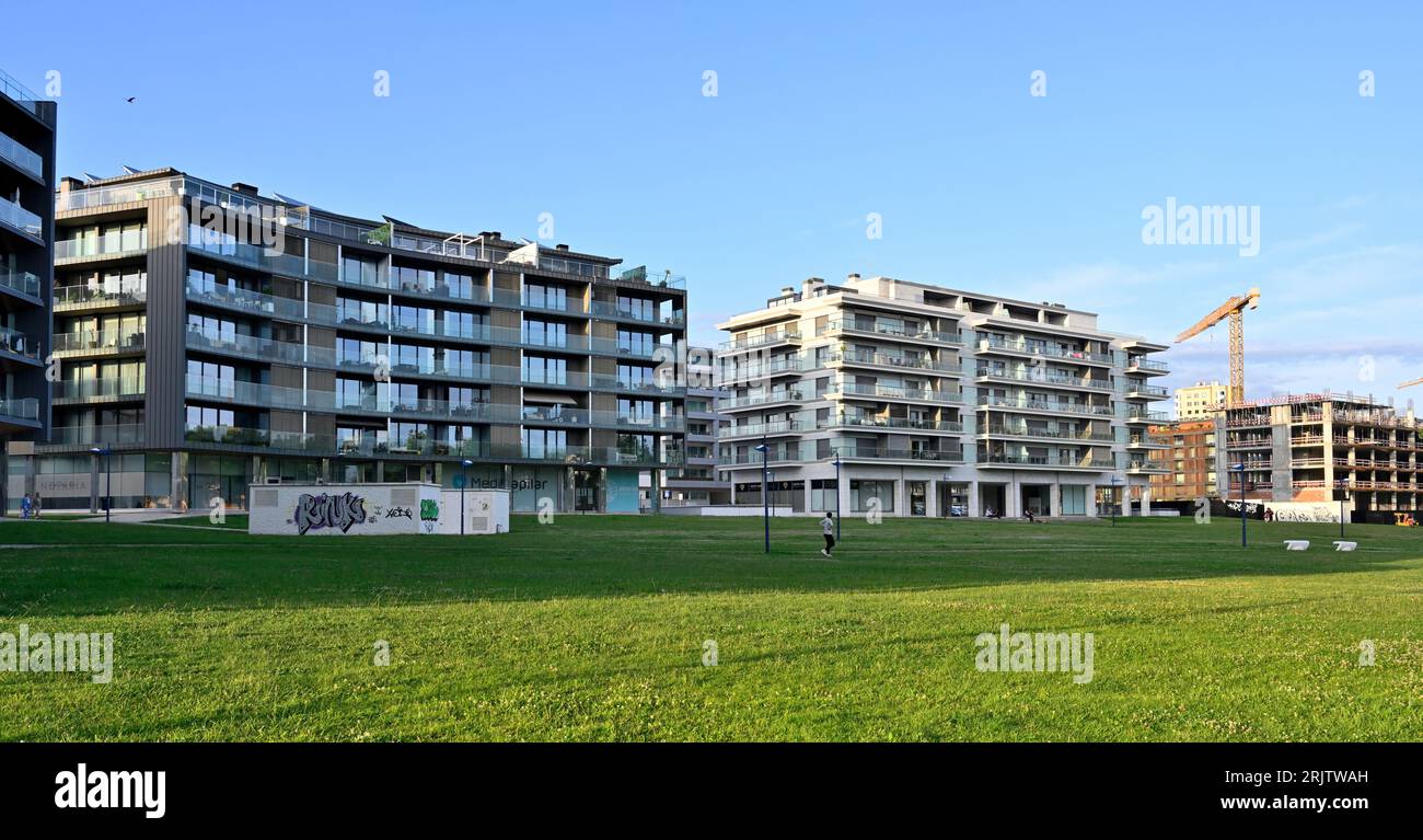 Modern office building with flats / apartments above and garden at front in central Aveiro, Portugal Stock Photo