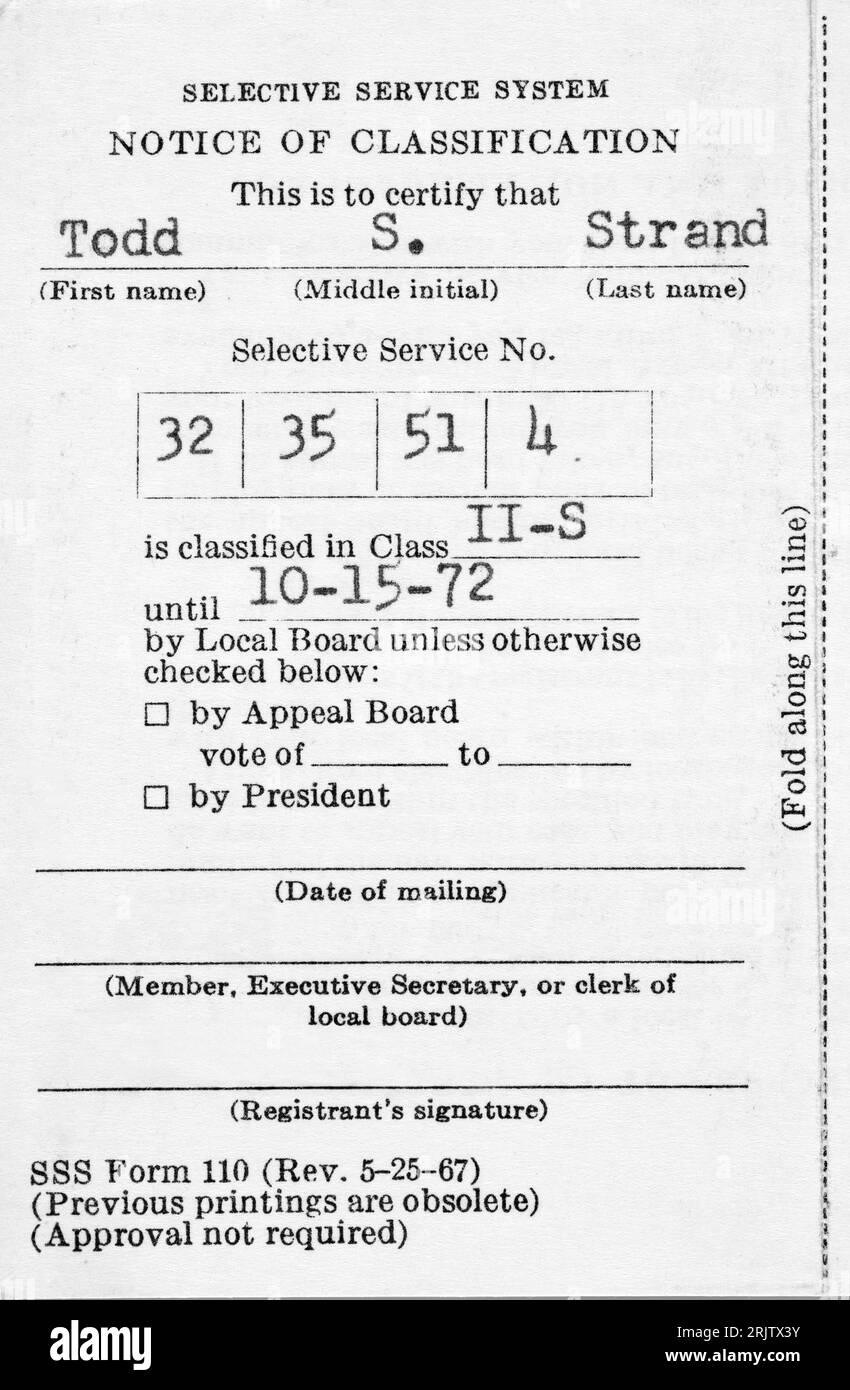 United States Selective Service System draft card from the Vietnam War era with a classification of II-S.  2-S classification indicated the registered Stock Photo