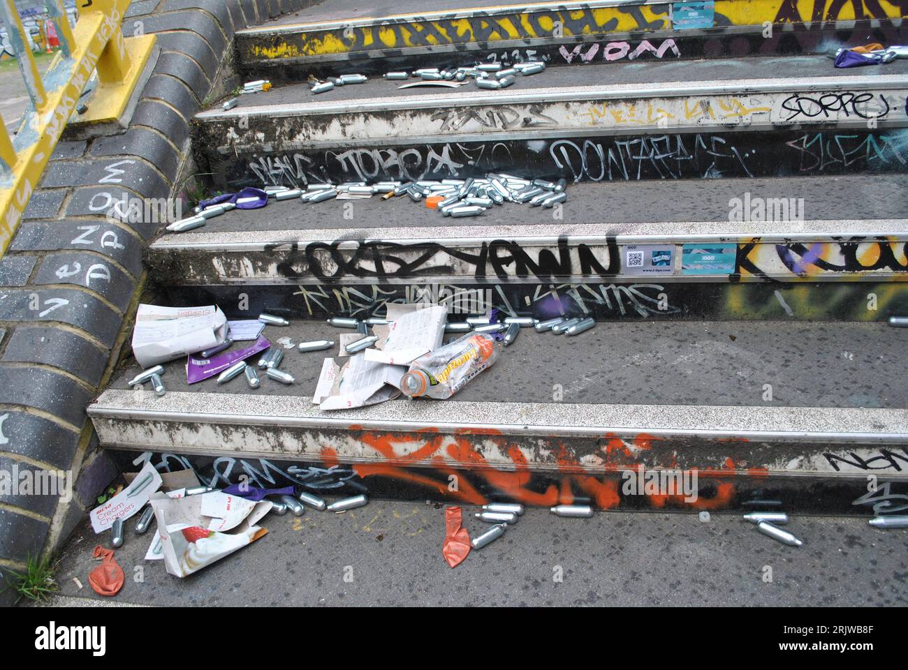 Used and discarded capsules of nitrous oxide lay on the steps of Fleet