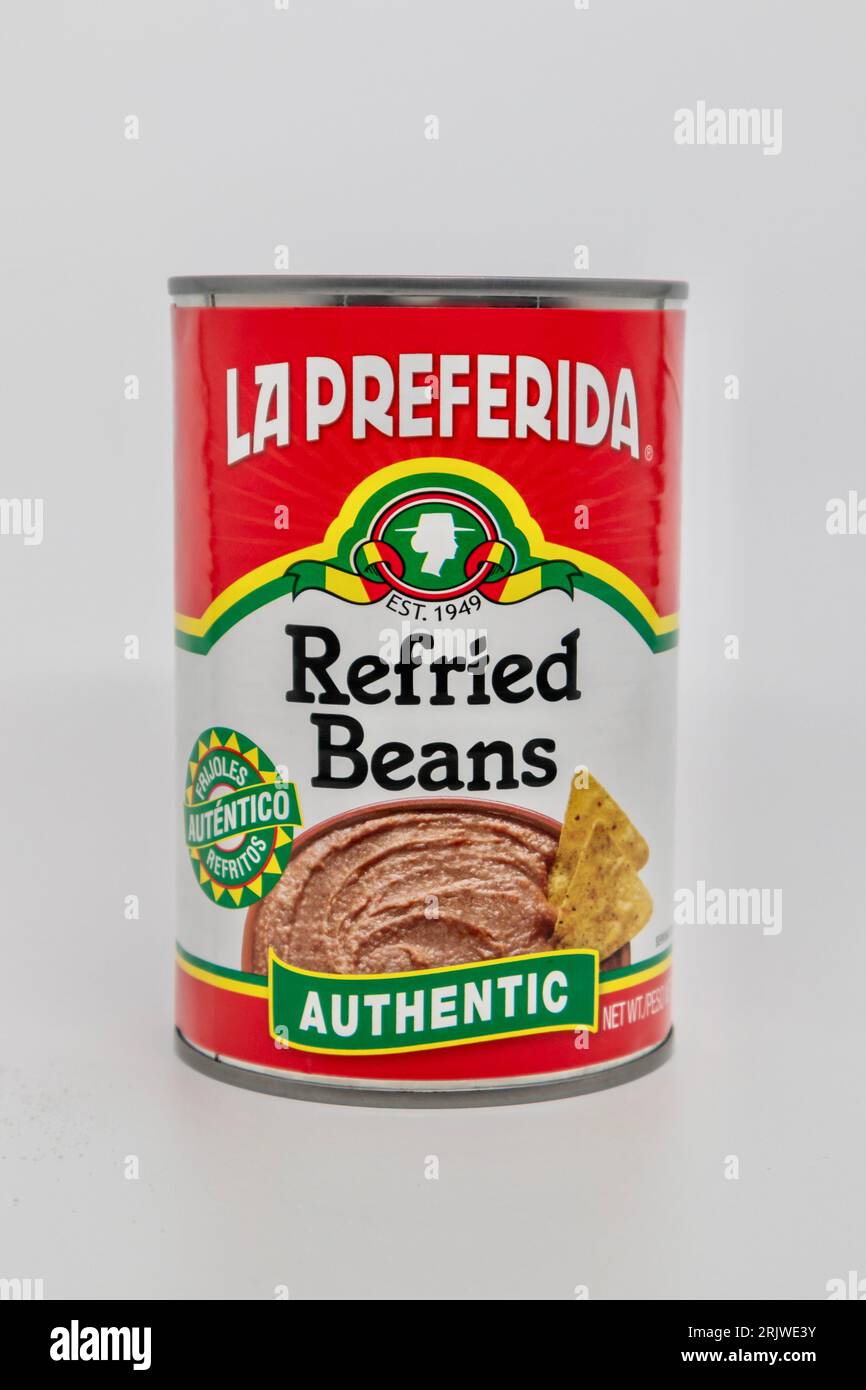 Can of La Preferida Refried Beans on white background with copy space
