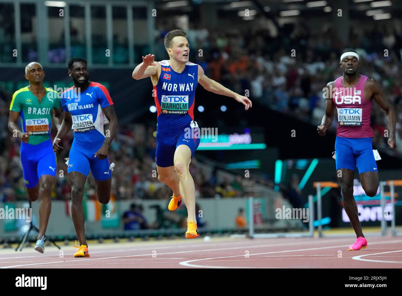 Karsten Warholm, of Norway crosses the line to win the gold medal in ...
