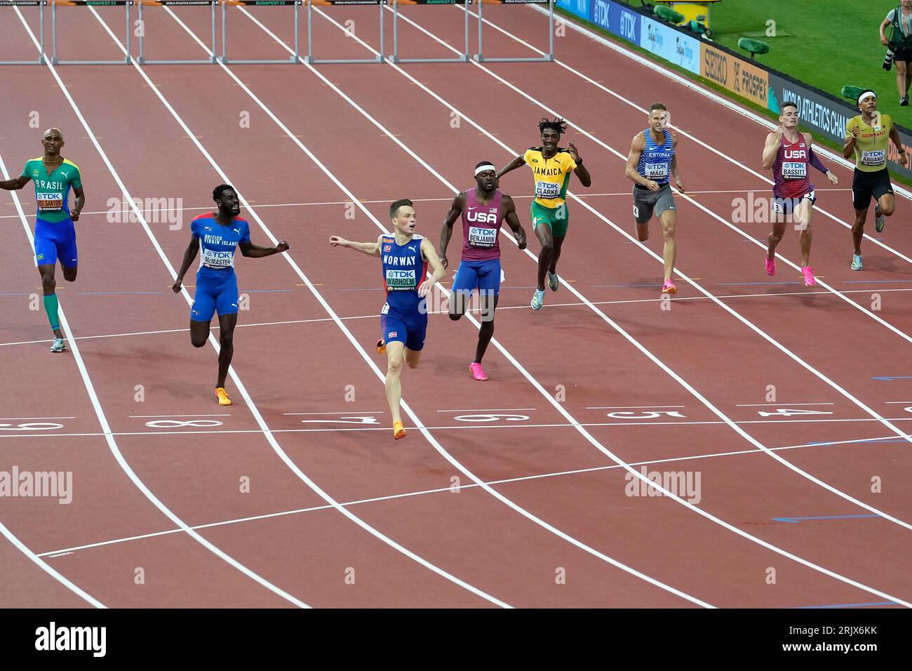 Karsten Warholm of Norway crosses the finish line to win the gold medal ...