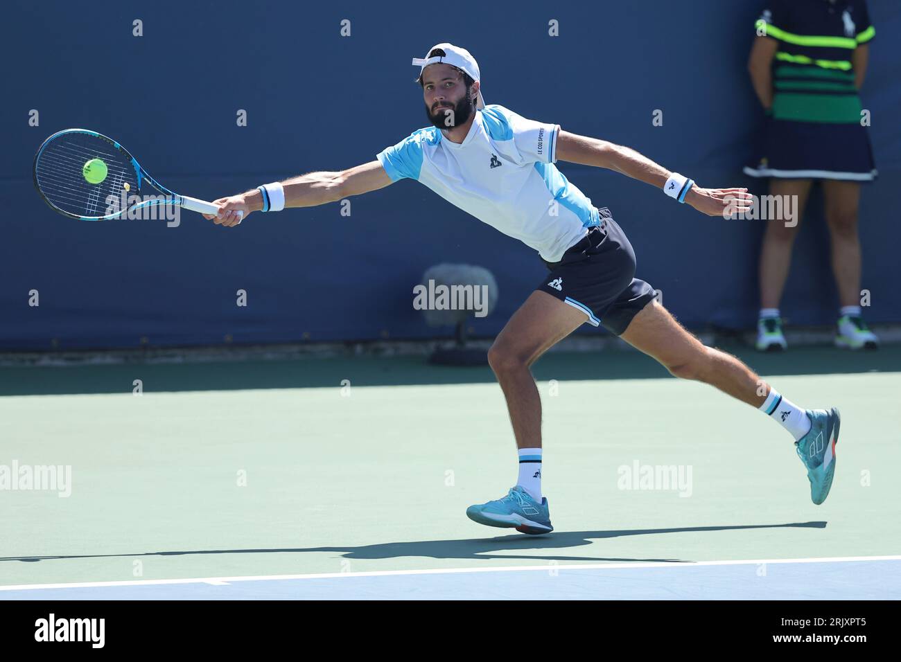 Titouan Droguet in action during a mens qualifying singles match at the 2023 US Open, Wednesday, Aug