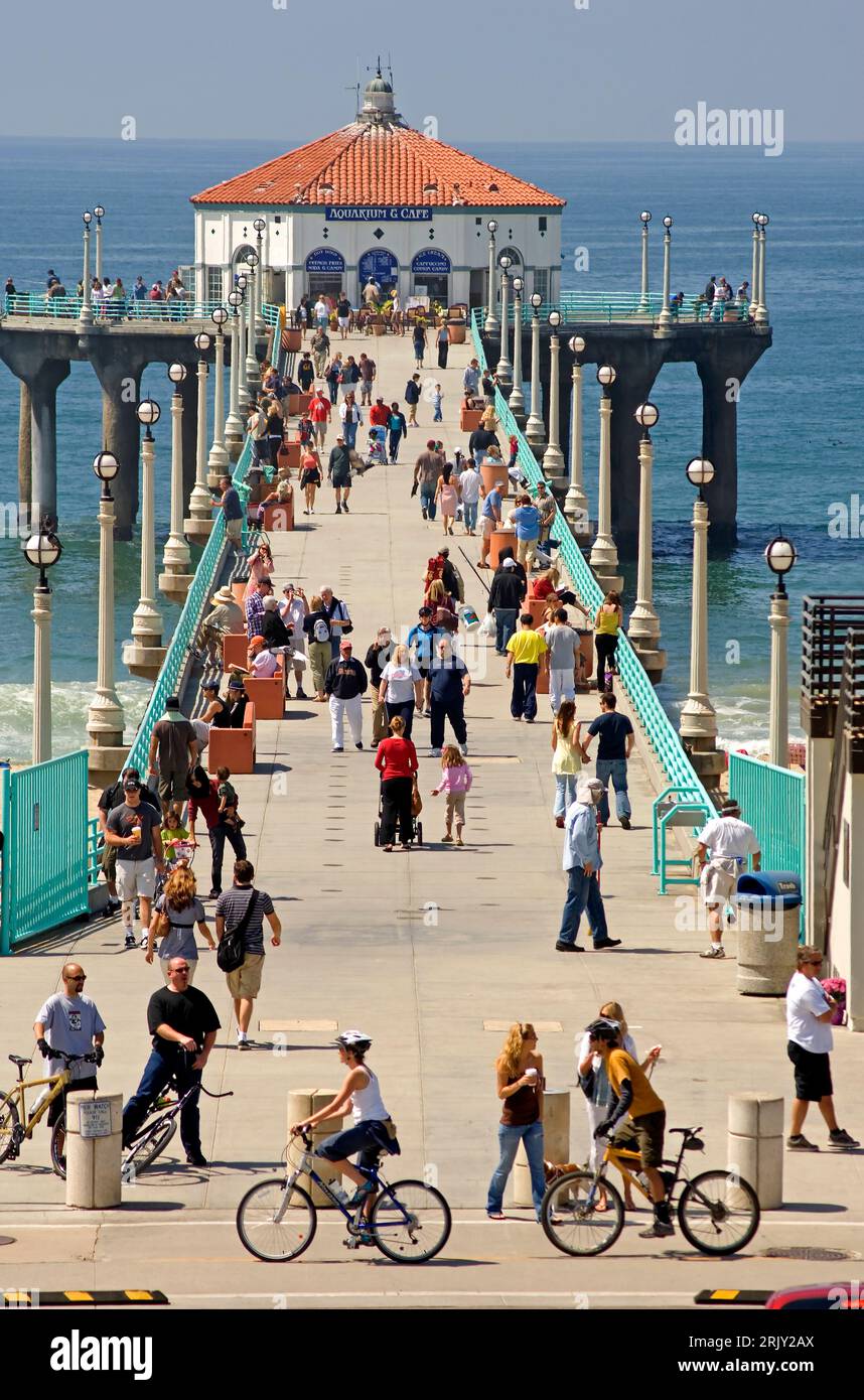 A crowd of people enjoying the Manhattan Beach Pier, Manhattan Beach, CA Stock Photo