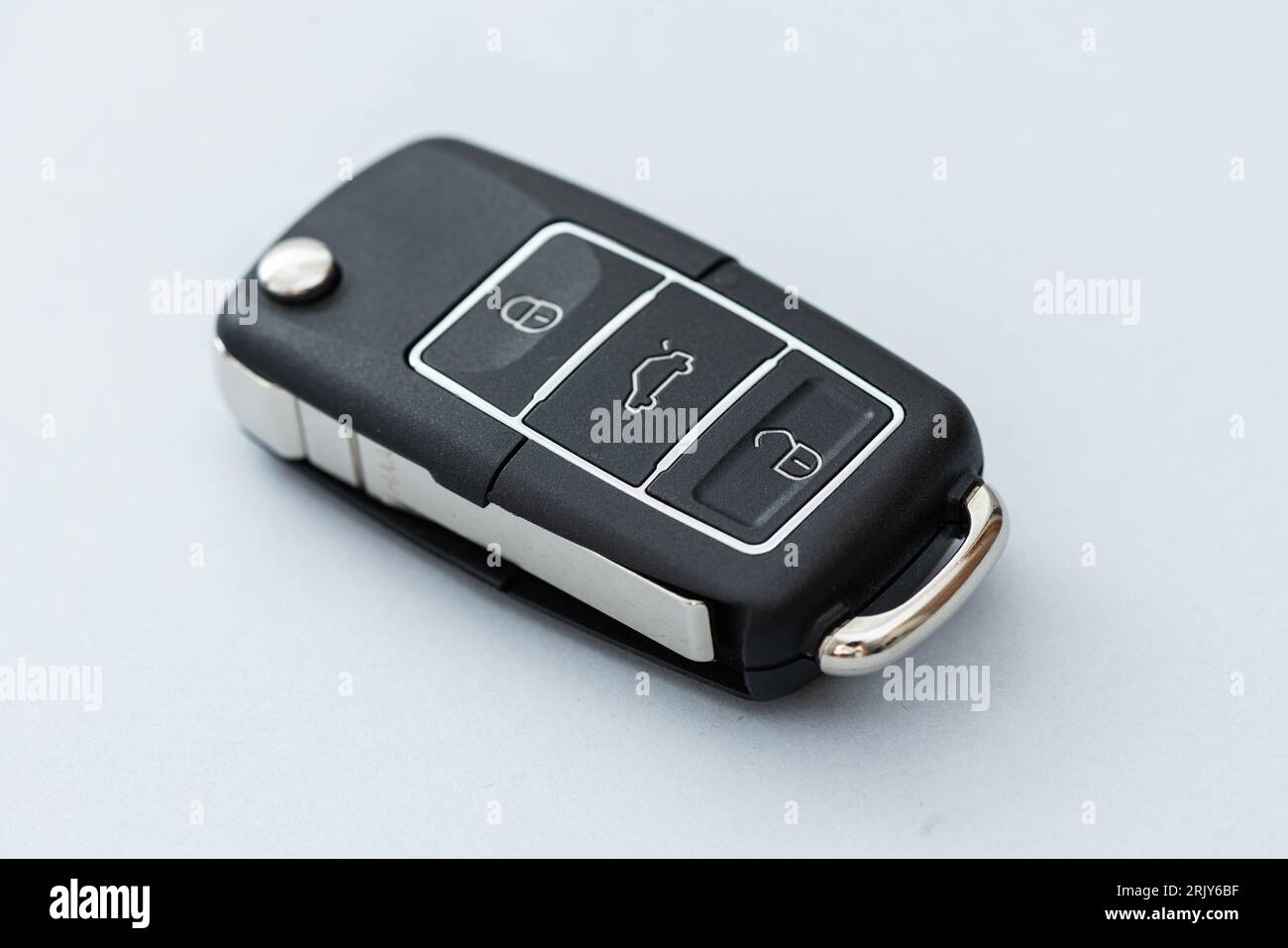 Wireless car key on the blue background. Stock Photo