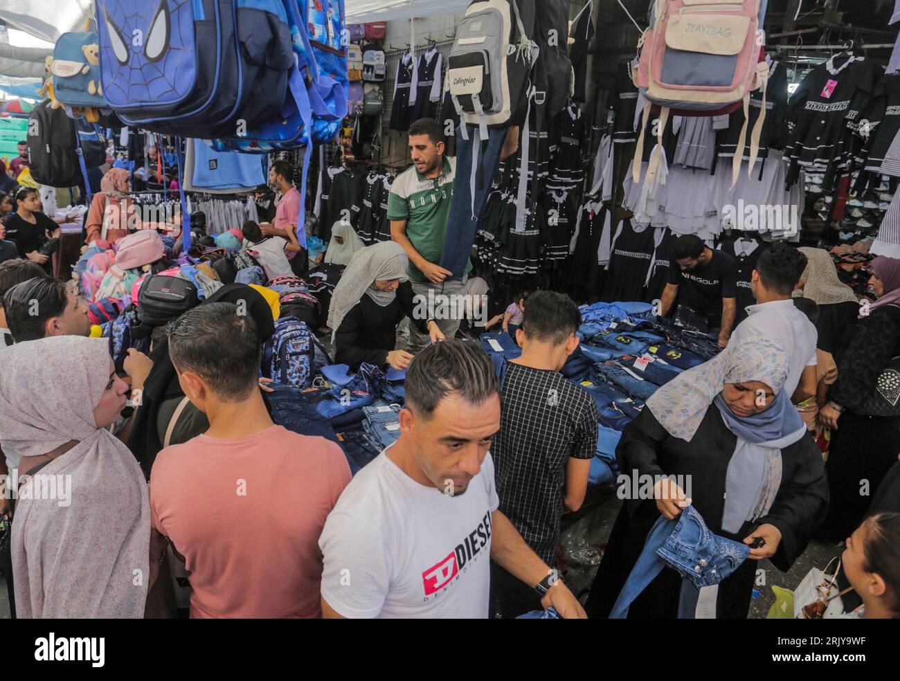 Gaza, Palestine. 23rd Aug, 2023. Palestinians seen shopping during the preparation for the new school year at the market in Gaza. (Photo by Mahmoud Issa/SOPA Images/Sipa USA) Credit: Sipa USA/Alamy Live News Stock Photo