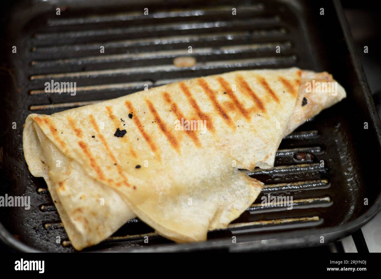 Syrian recipe cuisine background, chicken shawerma or shawarma tortilla