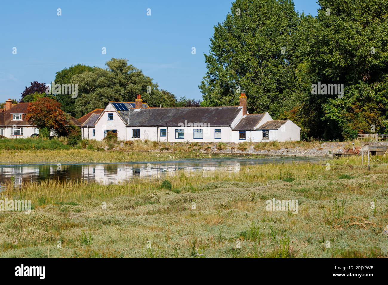 A National School building 1834 with commemorative plaque, Bosham, a