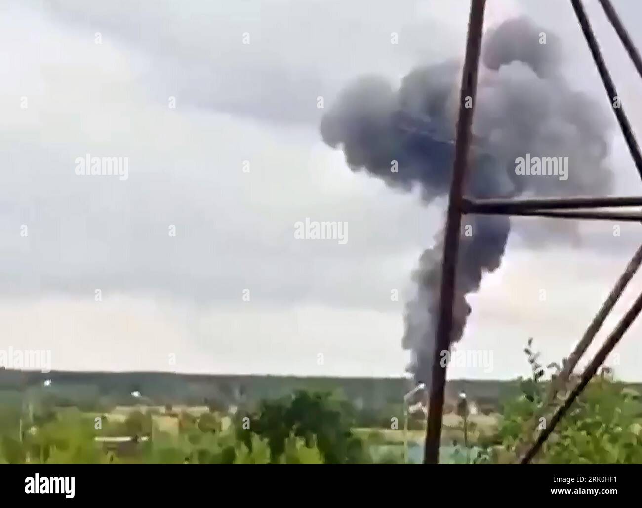 Tver, Russian Federation. 24th Aug, 2023. ? still image grabbed from the footage posted on a Wagner linked Telegram channel @grey zone on August 23, 2023, shows smoke rising over plane wreckage near the village of Kuzhenkino, Tver region, Russia on August 23, 2023. Russian Ministry of Emergency Situations said on Wednesday that a private plane crashed in Tver region, killing all 10 people aboard, while the Russian Federal Air Transport Agency, Rosaviatsia, said that Wagner chief Yevgeny Prigozhin was on the list of passengers. Photo by Gray Zone/ Credit: UPI/Alamy Live News Stock Photo