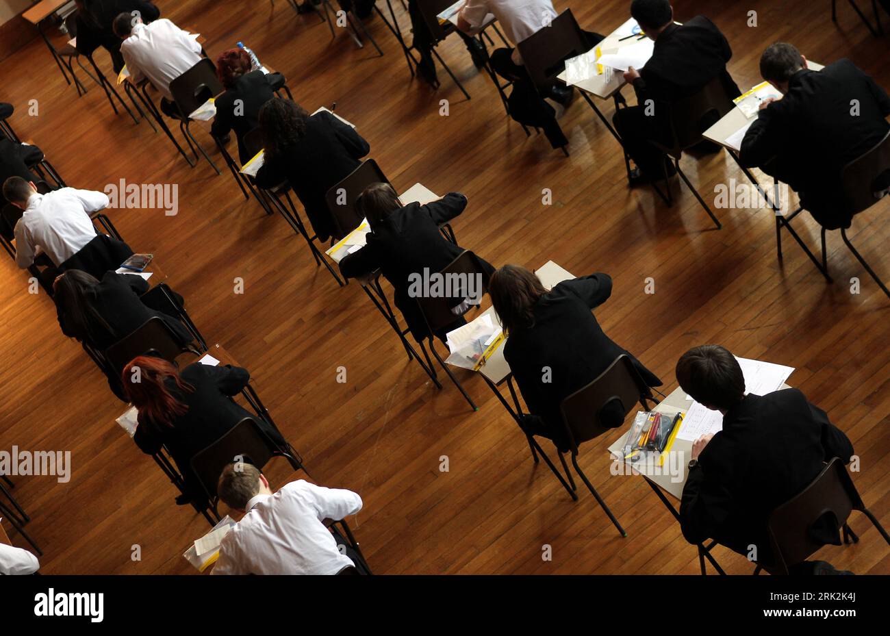 File photo dated 02/03/2012 of a math exam in progress at Pittville High School, Cheltenham. Teenagers across the country are waking up to their GCSE results in a year when the proportion of top grades awarded is expected to fall. Issue date: Thursday August 24, 2023. Stock Photo