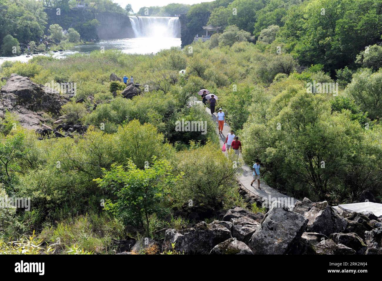 Dense forest and rushing river, Diaoshui Lake, Jingpo Lake National  Geopark, Mudanjiang, Heilongjiang Province, China Stock Photo - Alamy