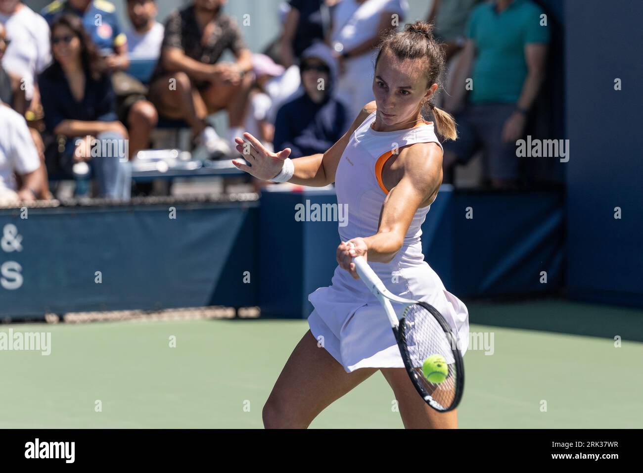 Ipek Oz of Turkiye returns ball during 1st round match against Emiliana Arango of Colombia of qualifying for US Open Championship at Billy Jean King Tennis Center in New York on August