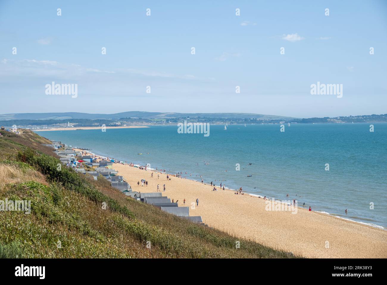 View Of Beach Huts At Milford On Sea Hampshire England With The Sea And View Of Beach Huts At Milford On Sea Hampshire England With The Sea And