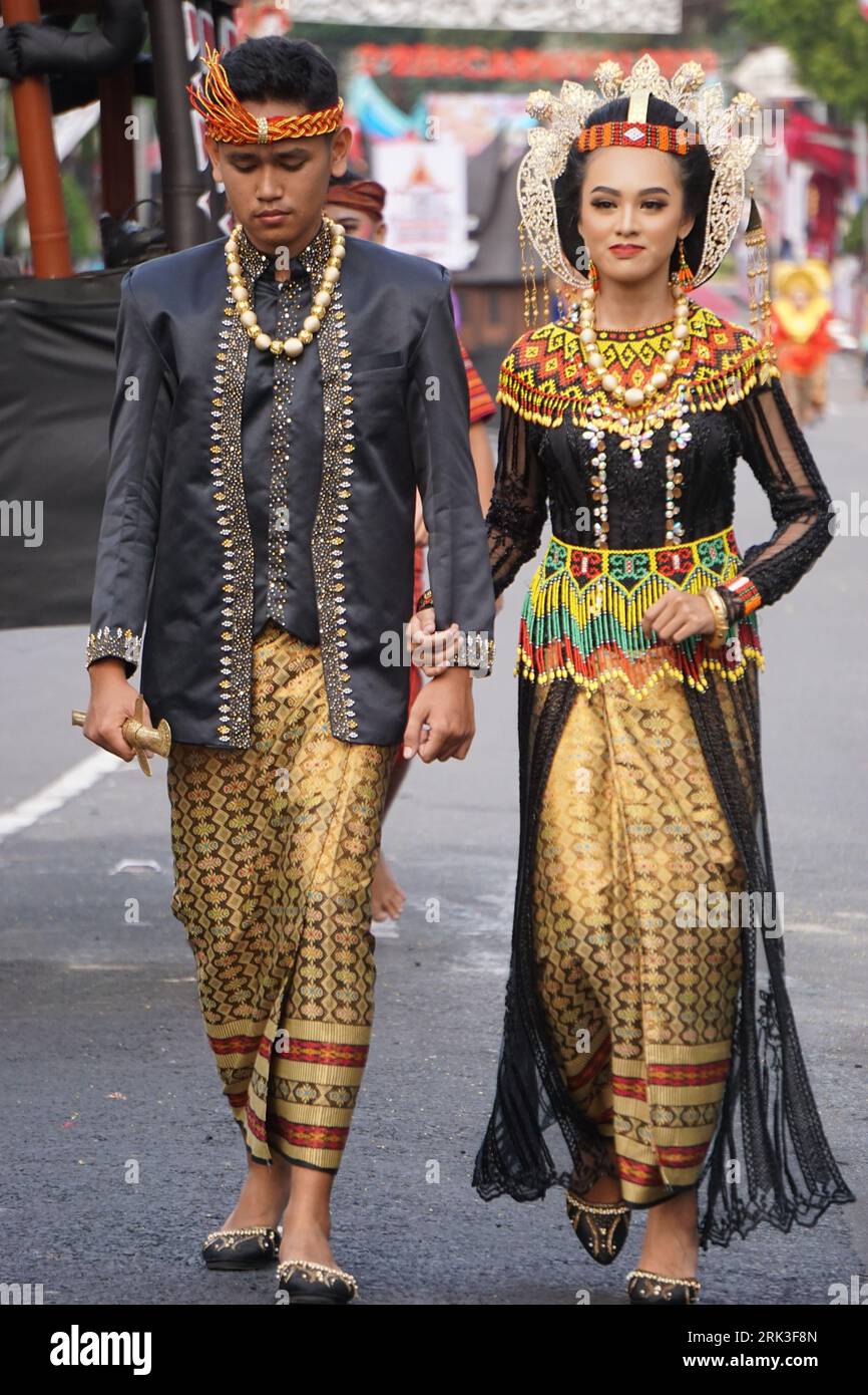 Indonesian with a traditional costume from south sulawesi at BEN Carnival Stock Photo