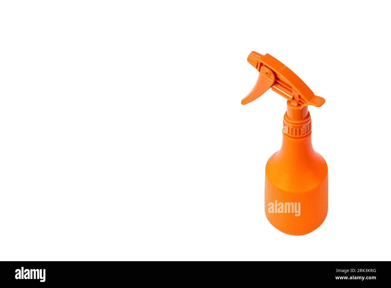 Orange spray bottle isolated on a white background Stock Photo - Alamy