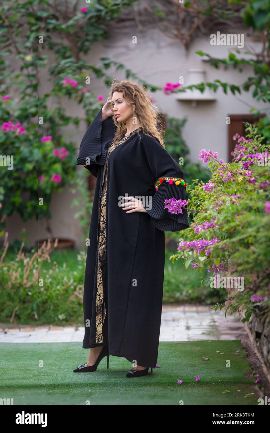 Arab women in traditional Designer Abaya Dress. Fashion Concept Stock Photo  - Alamy