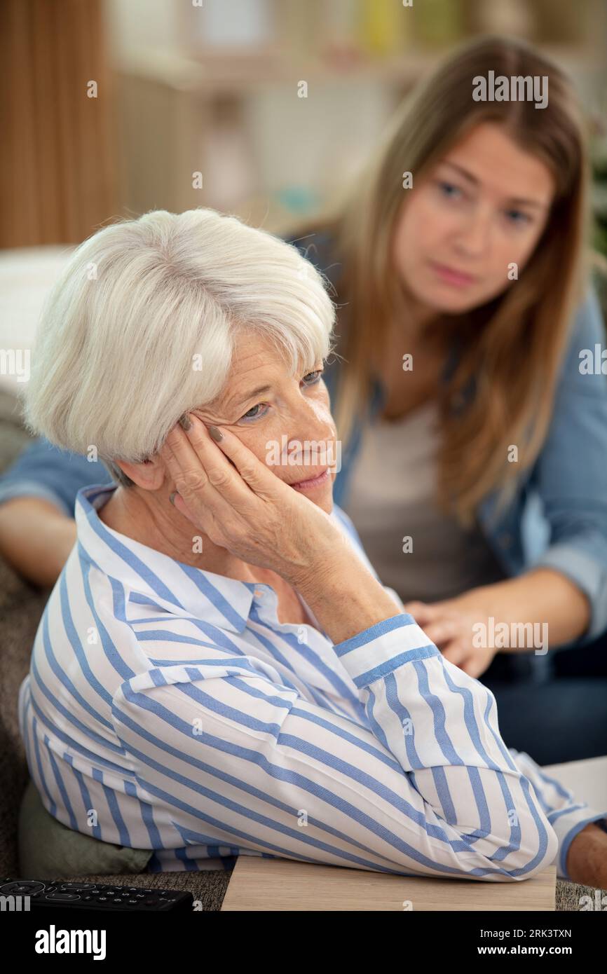sad senior woman with grey hair looking away Stock Photo - Alamy