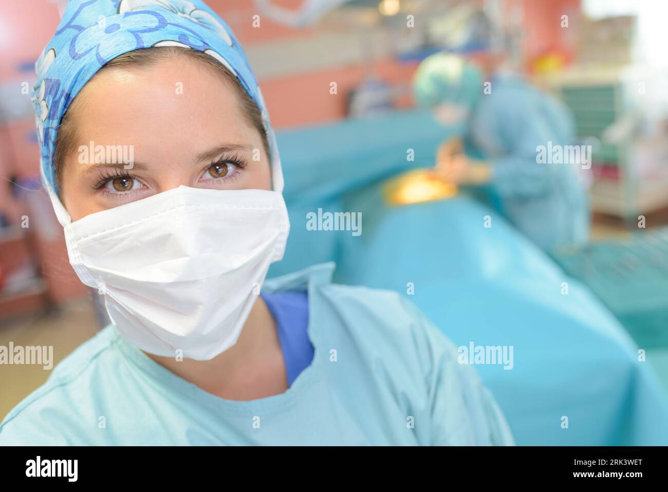 female surgeon portrait against white background Stock Photo - Alamy