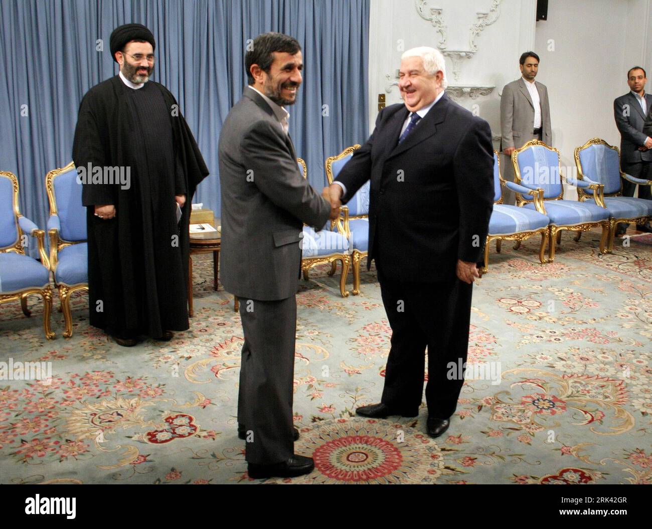 Bildnummer: 53579250  Datum: 04.11.2009  Copyright: imago/Xinhua (091104) -- TEHRAN, Nov. 4, 2009 (Xinhua) -- Iranian President Mahmoud Ahmadinejad (L front) shakes hands with the visiting Syrian Foreign Minister Walid Muallem in Tehran, capital of Iran, Nov. 4, 2009. Walid Muallem arrived in Iran on Wednesday for a two-day visit to the country. (Xinhua/Ahmad Halabisaz) (gxr) (2)IRAN-TEHRAN-AHMADINEJAD-SYRIAN FM-MEETING PUBLICATIONxNOTxINxCHN People Politik Premiumd kbdig xub 2009 quer     Bildnummer 53579250 Date 04 11 2009 Copyright Imago XINHUA  TEHRAN Nov 4 2009 XINHUA Iranian President Ma Stock Photo