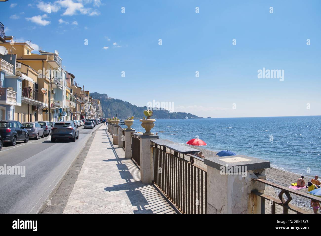 Street, promenade in the place called Giardini Naxos which is near Taormina in Sicily, Italy Stock Photo