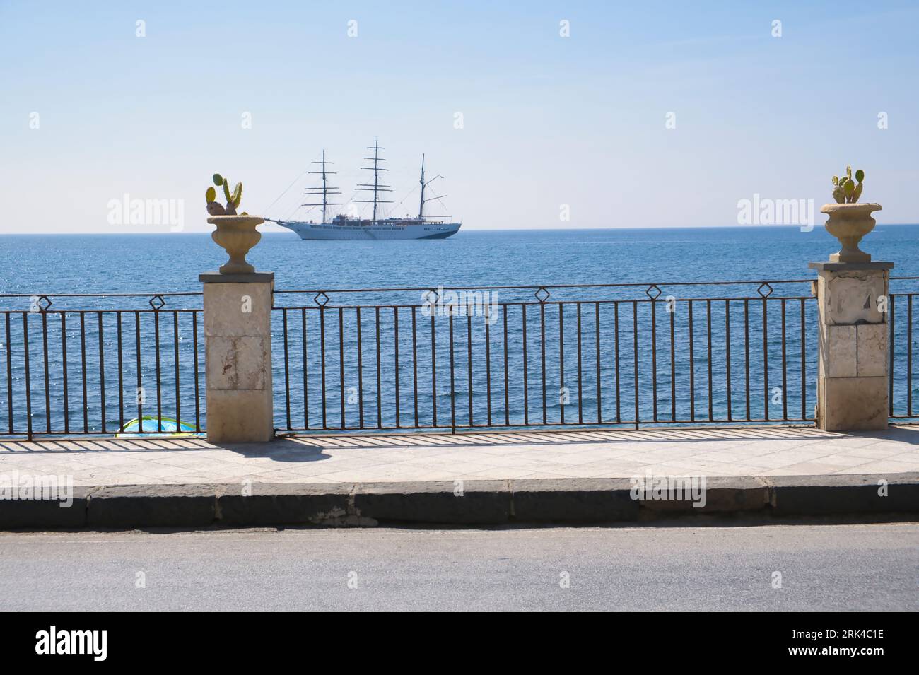 View of the blue sea in the place called Giardini Naxos which is near Taormina in Sicily, Italy Stock Photo