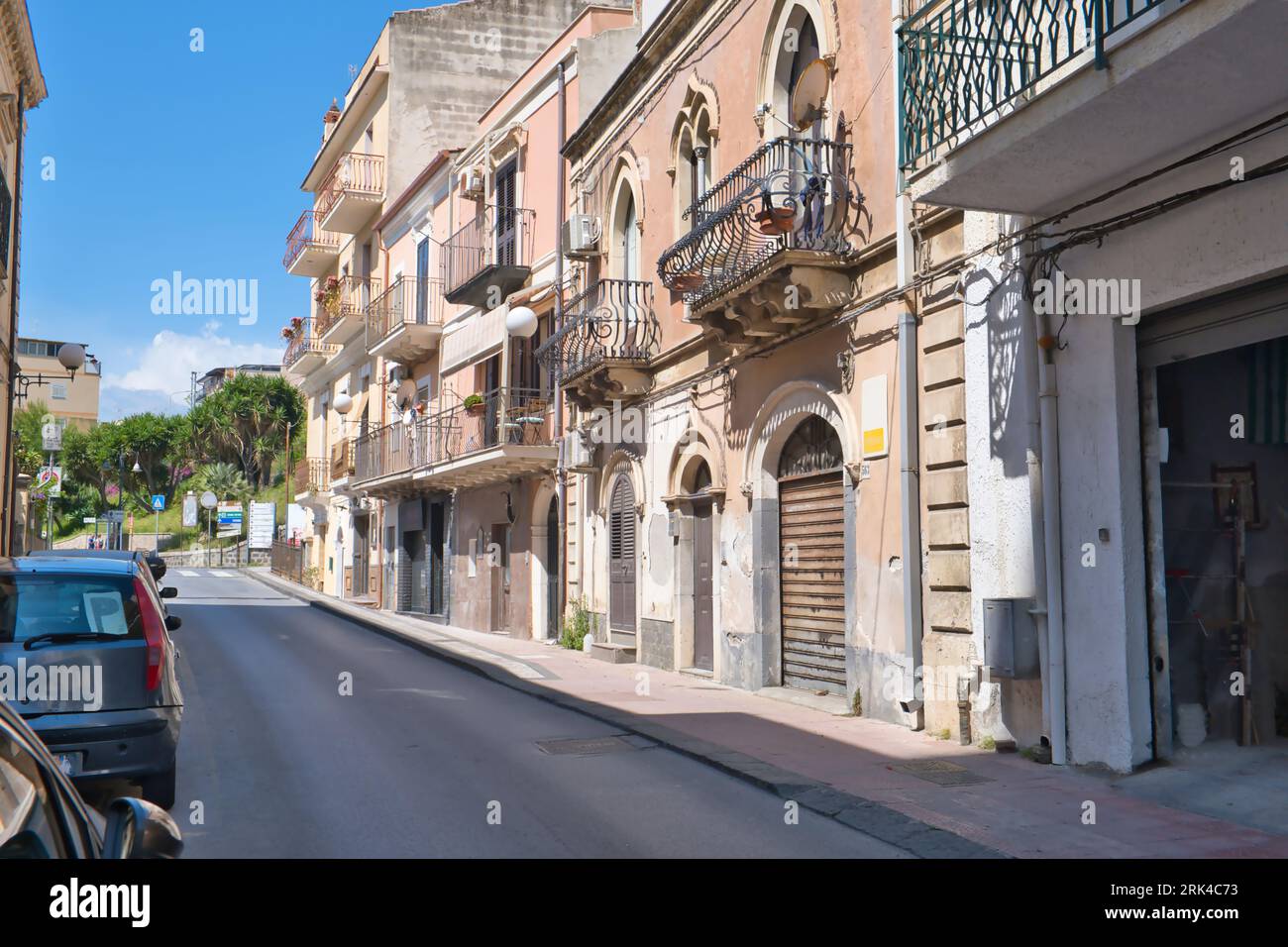 typical street in Giardini Naxos near Taormina, Sicily, Italy Stock Photo