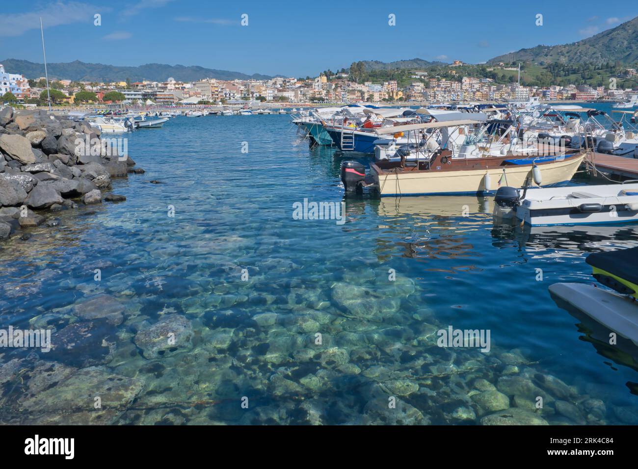small boat harbor, marina in Giardini Naxos, Sicily, Italy Stock Photo