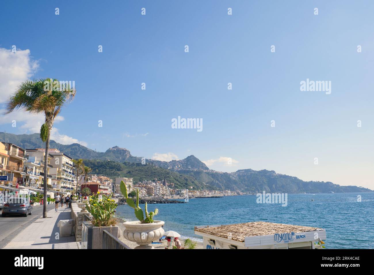 Giardini Naxos, Italy,  views of the blue sea and the mountains where Taormina is located Stock Photo