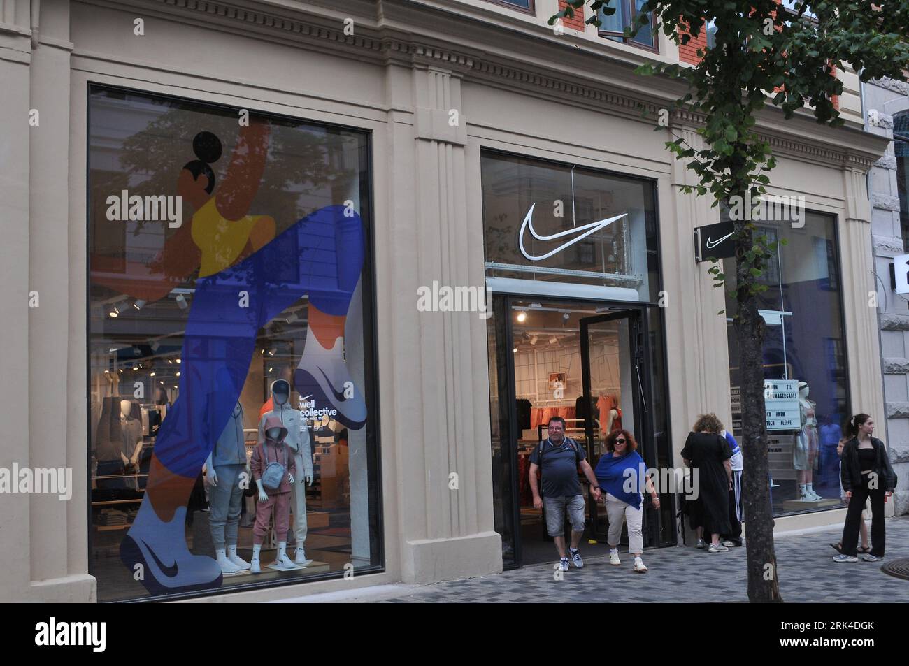 August Persons ouside Nike store in danish capital Copenhagen. (Photo.Francis Dean/Dean Stock Photo - Alamy