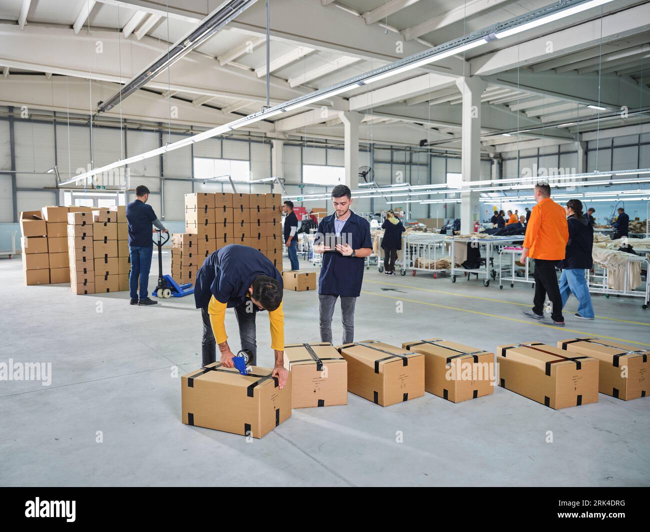 several sewing machines. Tailoring industry. jean making factory. jean