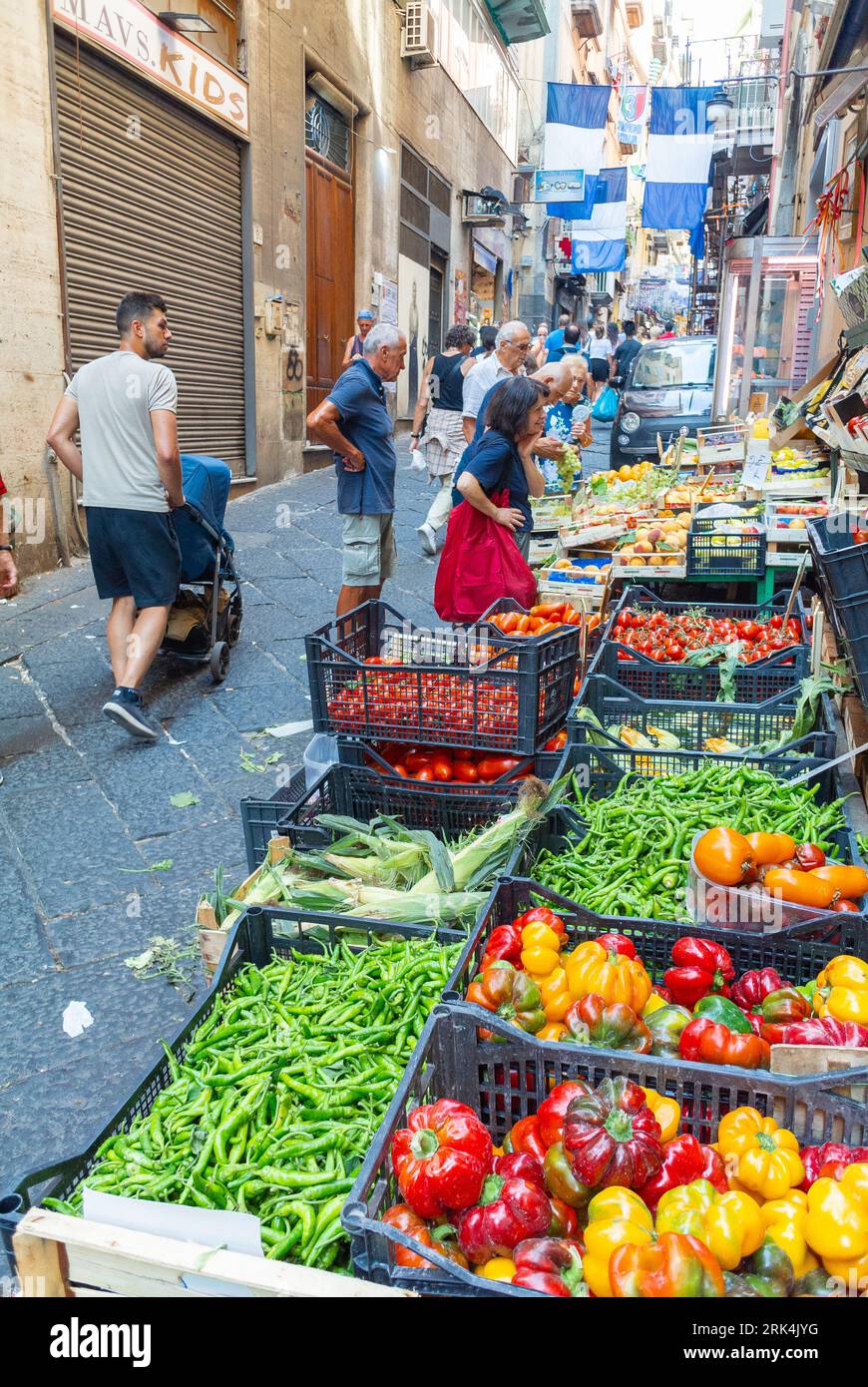 Naples, Metropolitan City of Naples, Italy, Neapolitan woman buying