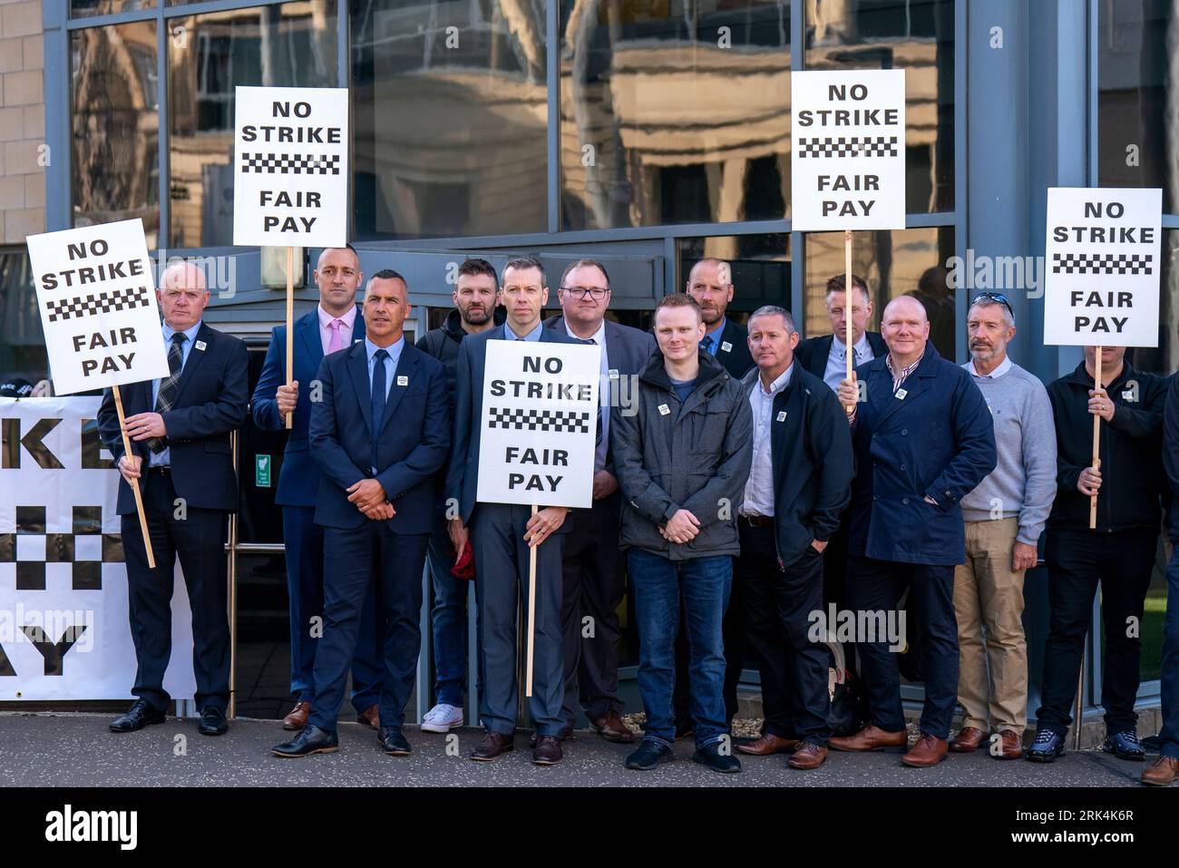Off-duty police officers from the Scottish Police Federation take part ...