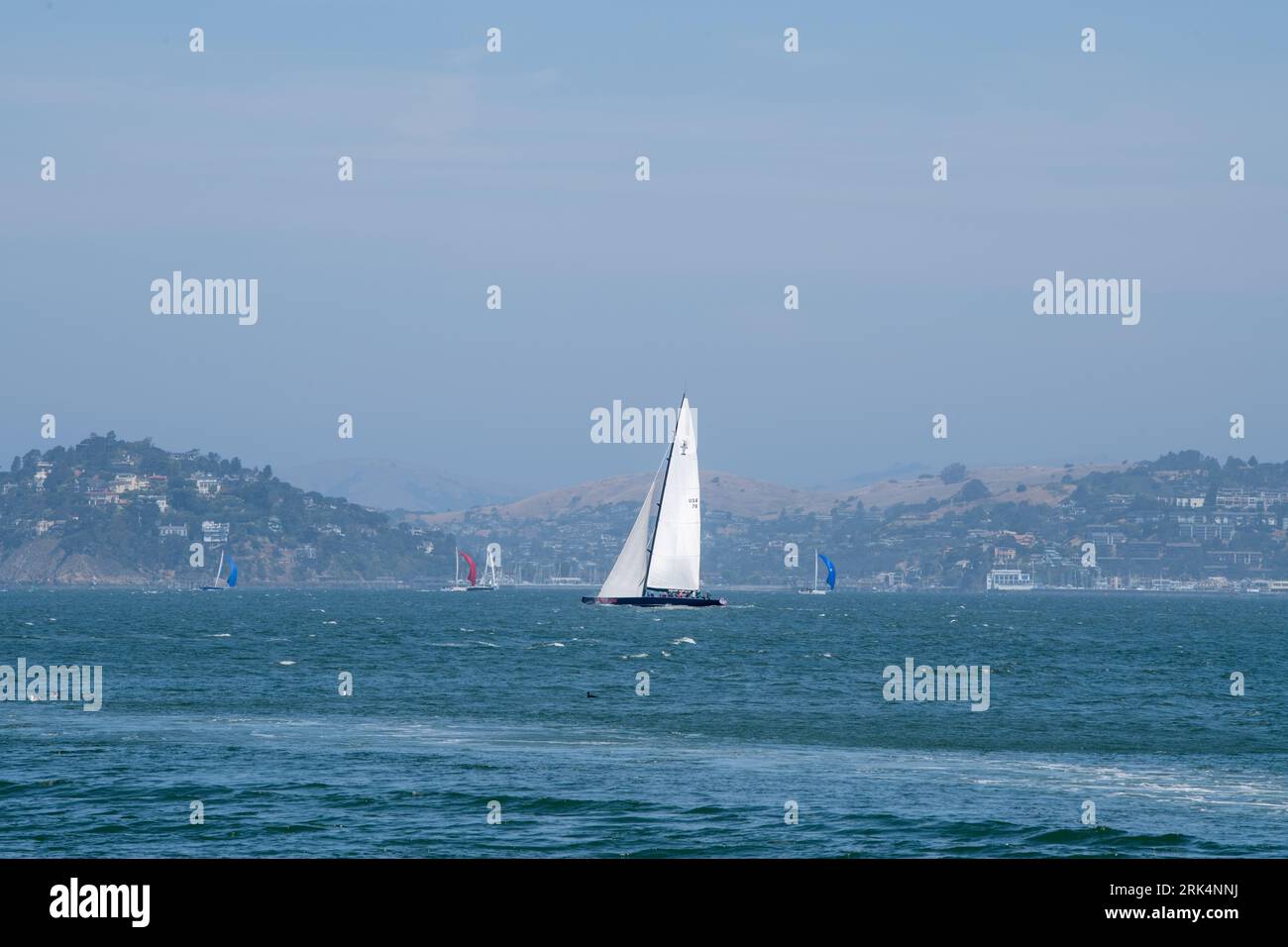 USA 76 sailing in San Francisco Bay Stock Photo