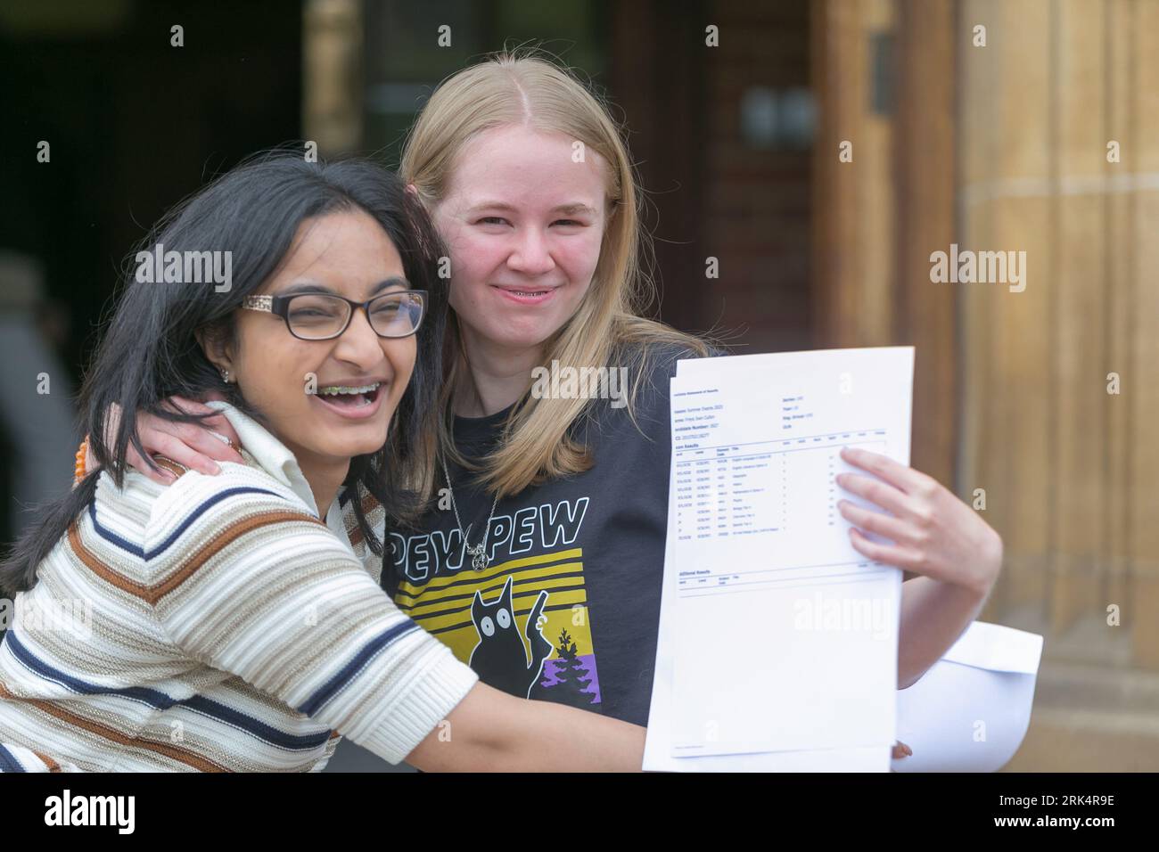 Birmingham, UK. 24th Aug, 2023. Oishani Sinha and Freya Cullen of King Edward VI High School for Girls, Birmingham, are certainly happy with their GCSE results Credit: Peter Lopeman/Alamy Live News Stock Photo